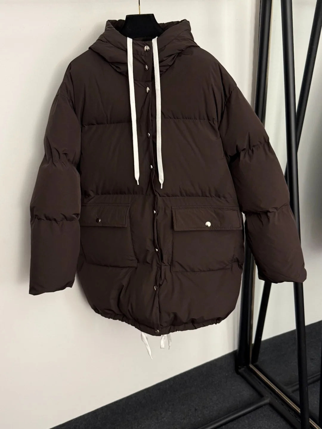 2026 autumn and winter large pocket waist cinched long sleeved hooded mid length cotton jacket for girls