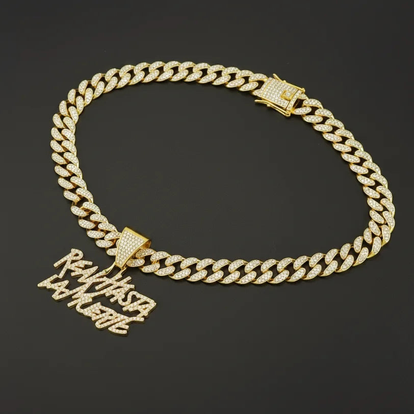 Hip-hop Cuban link necklace — "REAL HASTA LA MUERTE" pendant; gold and silver chains for a rapper-style look.