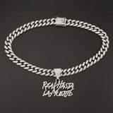 Hip-hop Cuban link necklace — "REAL HASTA LA MUERTE" pendant; gold and silver chains for a rapper-style look.
