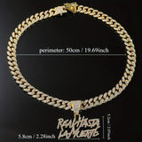 Hip-hop Cuban link necklace — "REAL HASTA LA MUERTE" pendant; gold and silver chains for a rapper-style look.