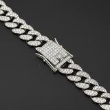 Hip-hop Cuban link necklace — "REAL HASTA LA MUERTE" pendant; gold and silver chains for a rapper-style look.