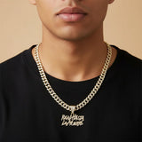 Hip-hop Cuban link necklace — "REAL HASTA LA MUERTE" pendant; gold and silver chains for a rapper-style look.