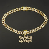 Hip-hop Cuban link necklace — "REAL HASTA LA MUERTE" pendant; gold and silver chains for a rapper-style look.